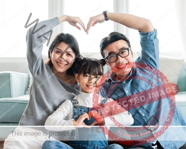 small asian family portrait at home